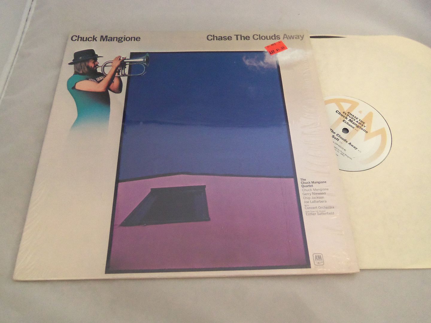 Chuck Mangione - Chase The Clouds Away