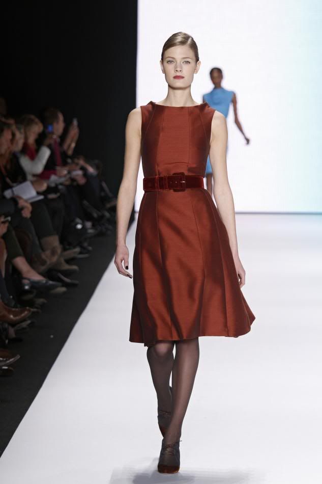 26. Rust silk and wool trapeze dress and rust velvet belt.