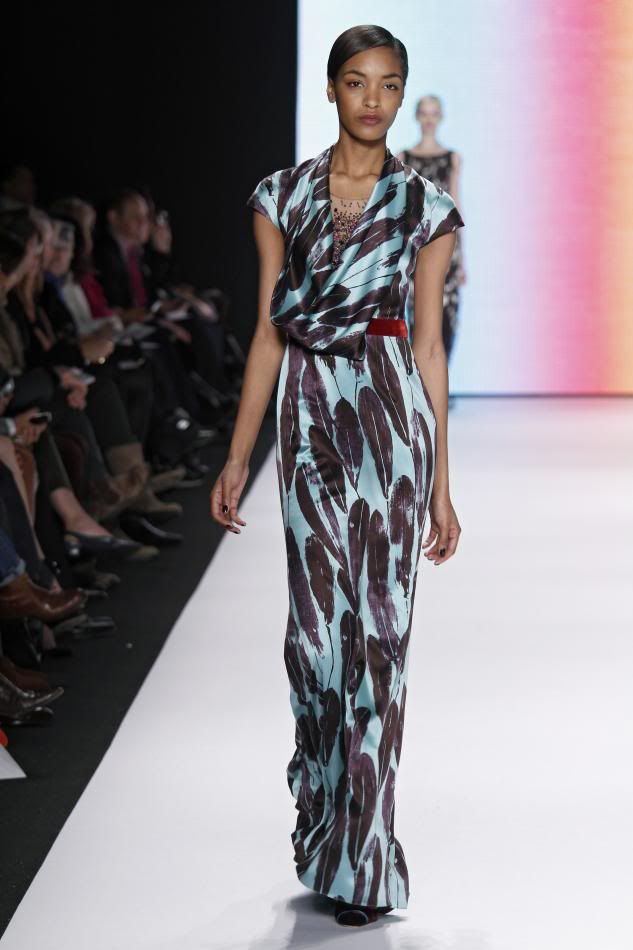 30. Jourdan: Turquoise and amethyst feather print embroidered gown and rust velvet belt.