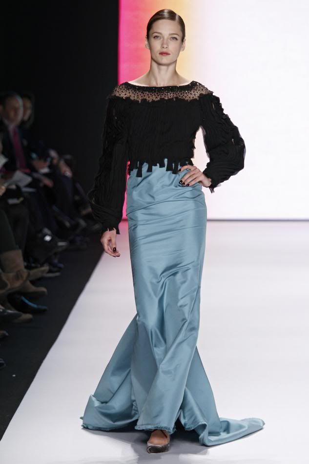 33. Karmen: Black and turquoise silk chiffon and faille long sleeve embroidered gown.