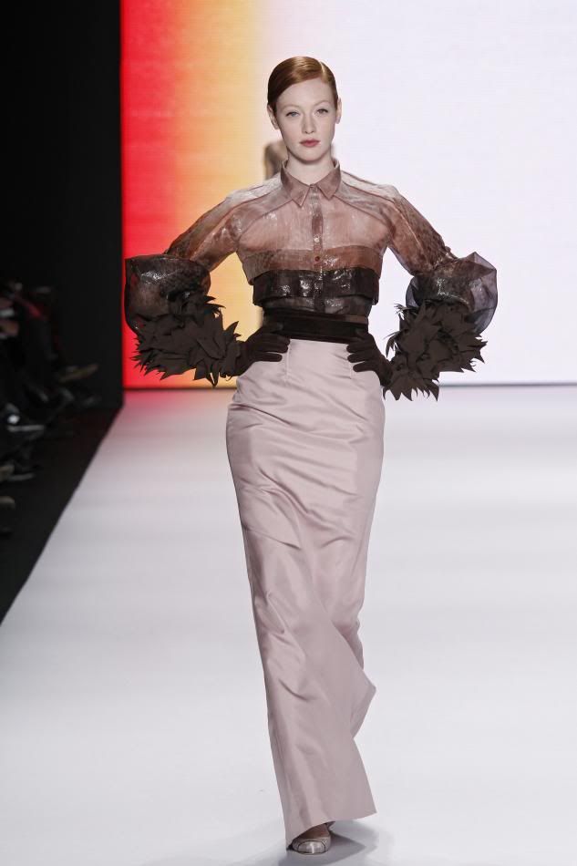 38. Rust abstract print organza blouse, primrose silk faille skirt, cocoa grosgrain embroidered gloves.