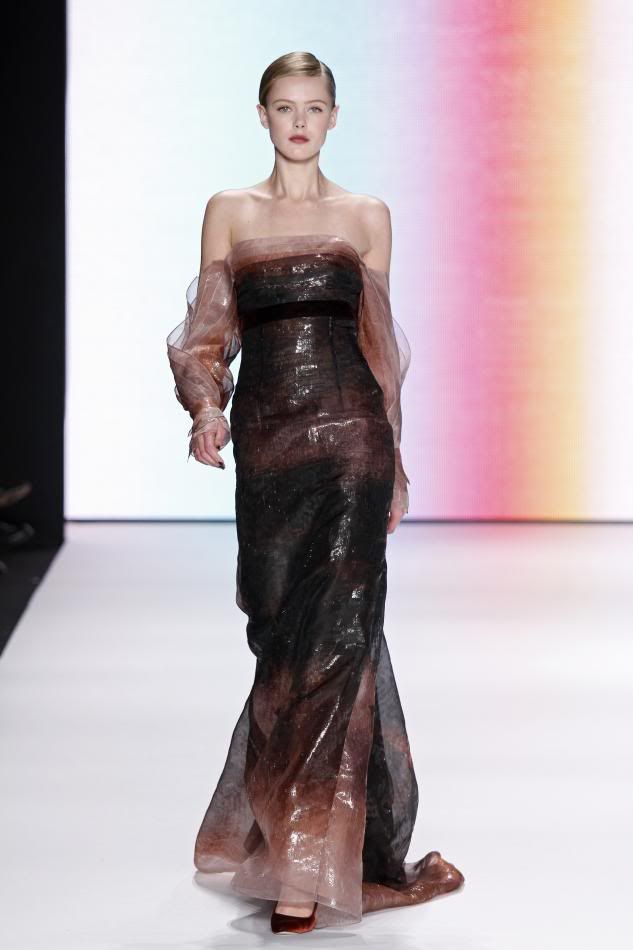 40. Frida:Rust abstract print organza gown.