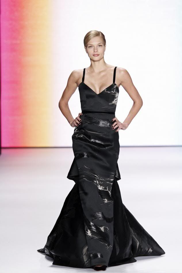 41. Katsia: Black liquid jacquard gown.