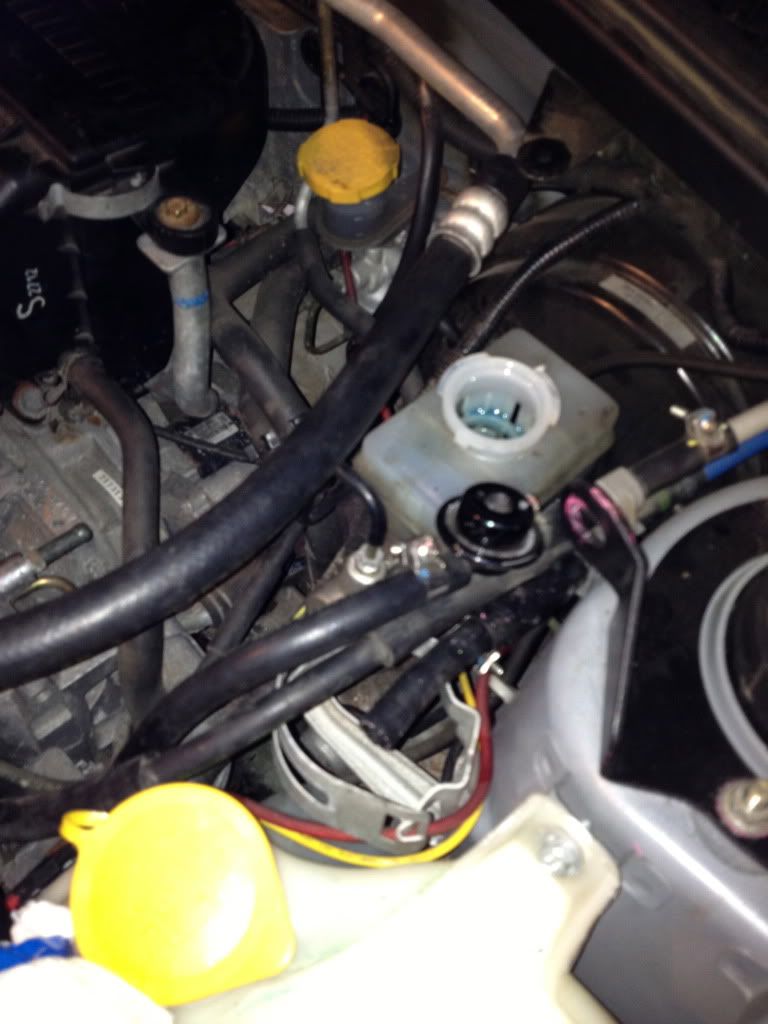 Suck out the fluid in the Master Cylinder. Unhook the electronic fluid level sensor plug (located below the master cylinder reservoir, to your left when ...