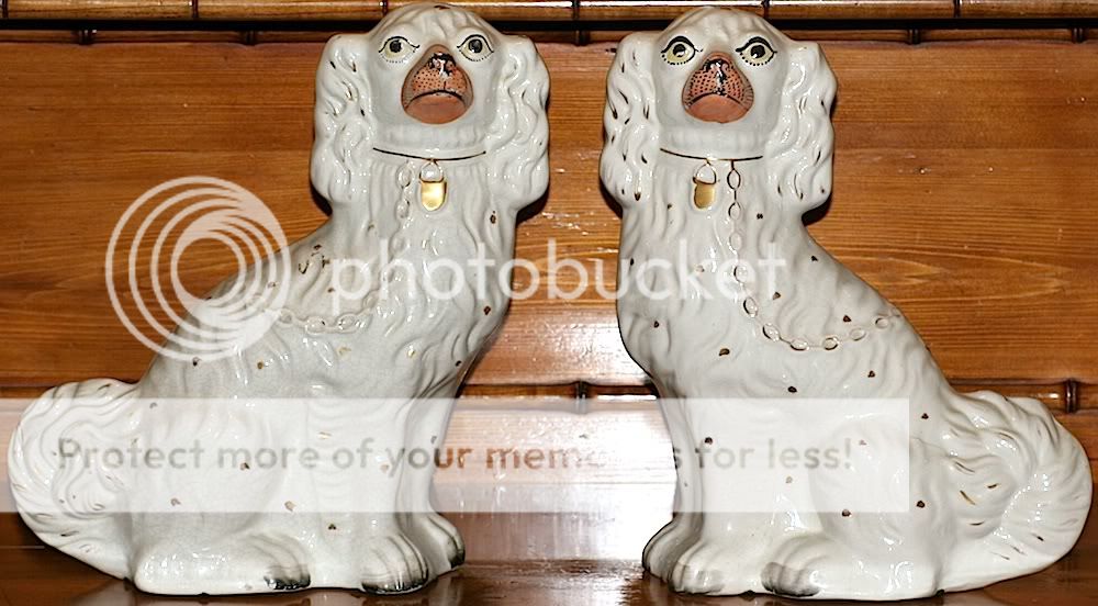 Pair of white Staffordshire dogs  